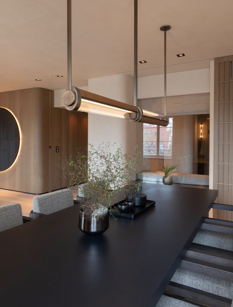 Articolo Studios Swivel Double Pendant and Loopi Wall Sconce in Dining Area