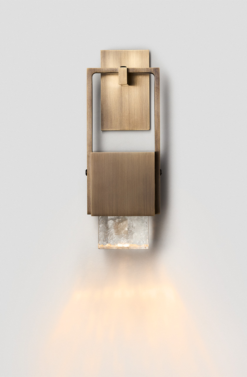 Articolo Studios Luxury Lighting. Cubo swing wall sconce in ice and bronze