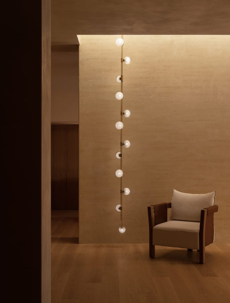 Articolo Studios Lluxury Lighting Custom Trilogy anf Saddle Arm Chari in Willis St Showroom