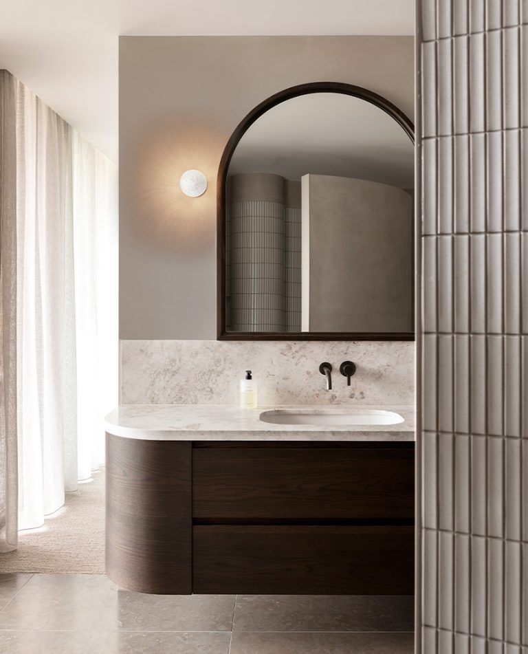 Articolo Studios Luxury Lighting Fizi Wall Sconce on Round in Bathroom of lynch residence by casa 62