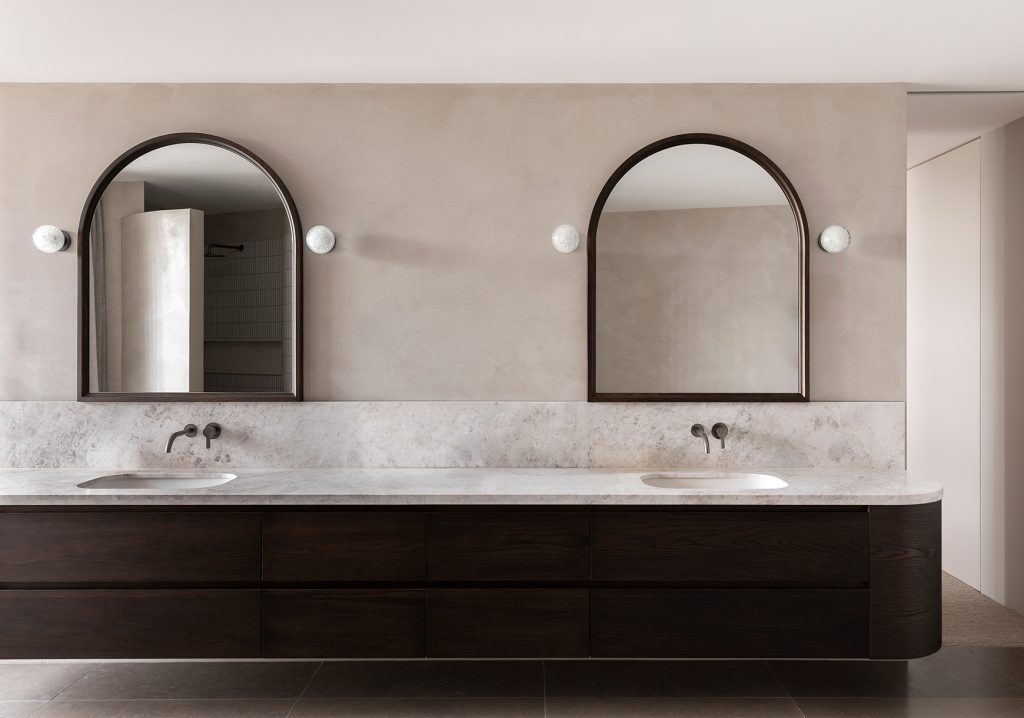 Articolo Studios Luxury Lighting Fizi Wall Sconce on Round in bathroom of Lynch Residence by Casa 62