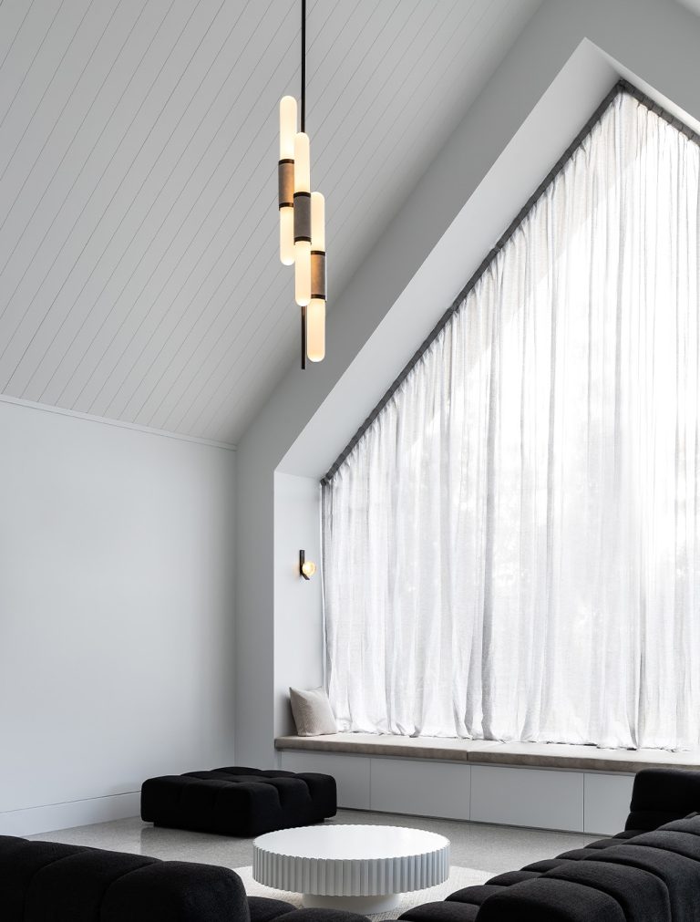 Articolo Studios Luxury Lighting Scandal Staggered Pendant and Fizi on Kick Wall Sconce in recreational room of the peninsula farmhouse