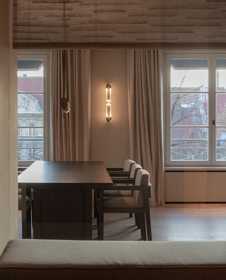 Articolo Studios Luxury Lighting Swivel Double pendant and Loopi Double Wall Sconce in Hotel Dining